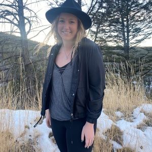 The black jacket and stripped black tank top!!